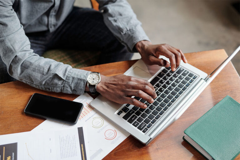 Man working on his business on a laptop.